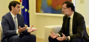 Rivera y Rajoy negociando