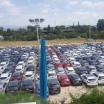 Más de 400 coches de alquiler, aparcados en un solar público en Can Pastilla